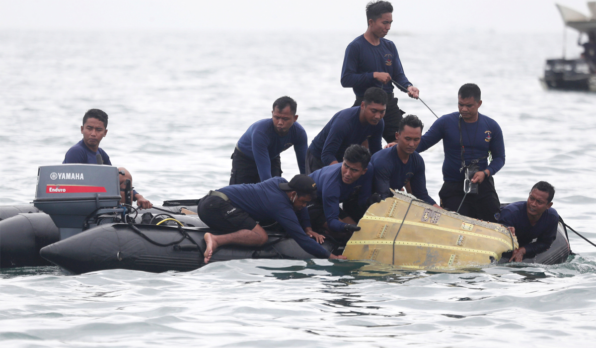 Indonesia says Boeing jet broke apart upon impact with water